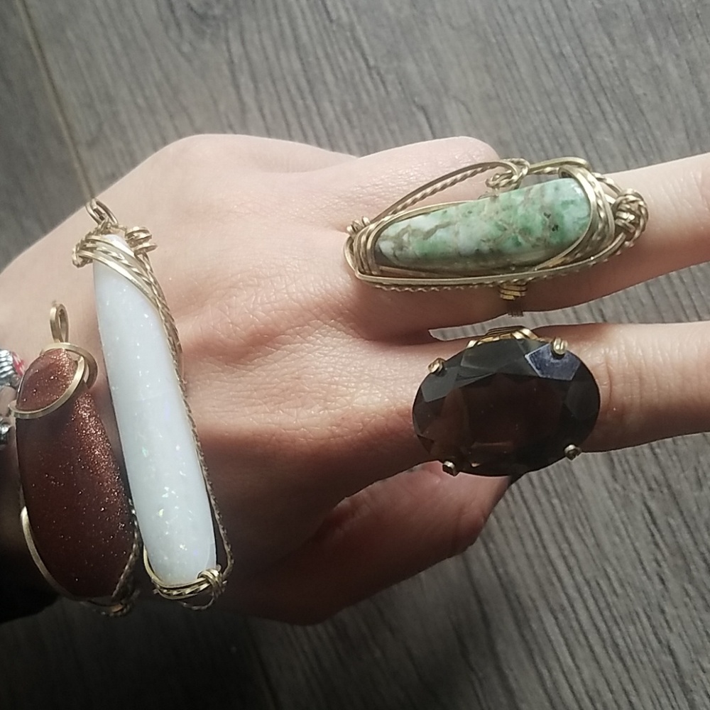 2 gold rings and 2 pendants